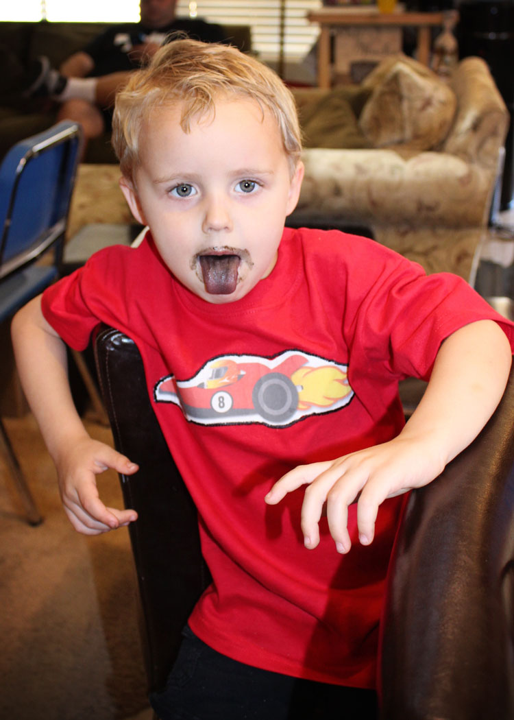 kid-with-black-tongue
